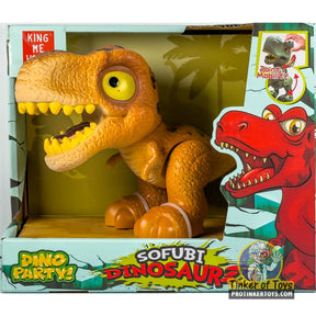 Cartoon T-Rex toy in open box with red dinosaur figure for King Me World IMX17201