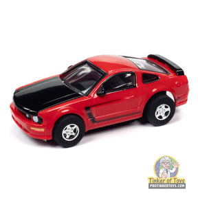 Red Ford Mustang GT toy car, 2005 model, viewed from the side for Auto World SC383