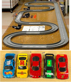 Slot car track layout with various colored race cars ready for play for Tyco TCRLG002