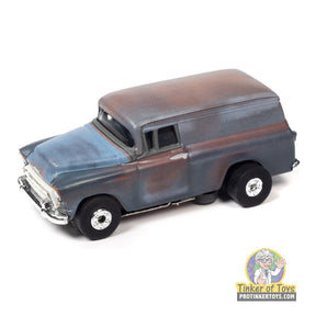 Blue and brown 1957 Chevrolet Suburban toy vehicle for Auto World SC392