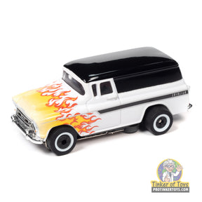 Yellow and black 1957 Chevrolet Suburban toy car with flames for Auto World SC392