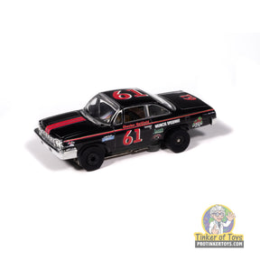 Black and red 1962 Chevrolet Bel Air toy car with racing decals for Auto World SC423, front view