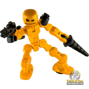 Yellow villain action figure with black accessories, ready for play for KlikBot TST1600