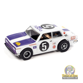 Slot car of a white 1970 Datsun 510 race car for Auto World SC393