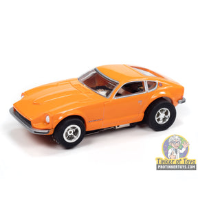 Orange slot car of a 1973 Datsun 240Z sports car for Auto World SC412