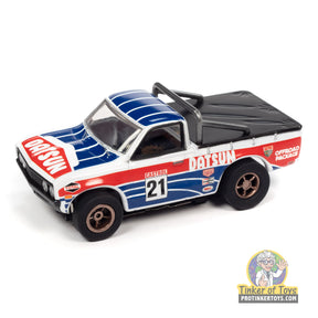 Red, white, and blue Datsun 620 pickup toy truck for Auto World SC393