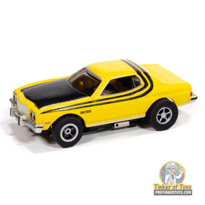 Yellow and black 1976 Ford Torino toy car for Auto World SC417