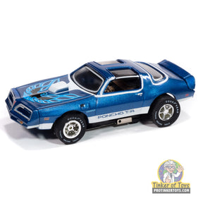 Blue and white slot car of a 1978 Pontiac Firebird T/A for Auto World SC410, front view