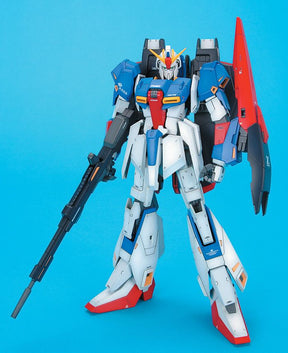 Zeta Gundam model kit with rifle, standing against a solid blue background for Bandai BAN139597
