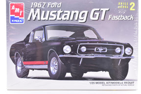 Black 1967 Ford Mustang GT Fastback model kit box art for AMT 6631
