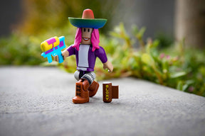 Roblox character with sombrero holding blue and yellow toy gun for UCC 19849