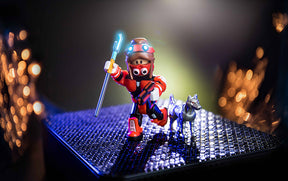 Roblox figure with glowing staff and small companion on a laptop for UCC 19889