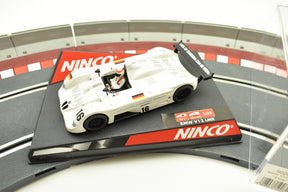 White BMW V12 LMR race car toy on a track base for REH Ninco 50262