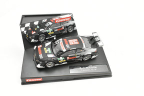 Two slot cars: Audi RS 5 DTM models in a black display box for Carrera 27542