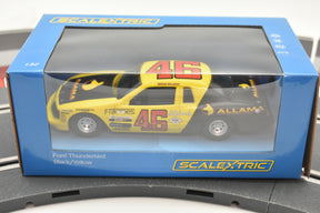 Slot car Ford Thunderbird race car in yellow and black, 1:32 scale model for Scalextric C4088