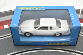 White Ford Thunderbird slot car in its box for Scalextric C4077