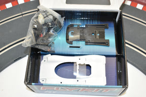 Porsche 908 model kit parts laid out in an open box for Fly Car 88311