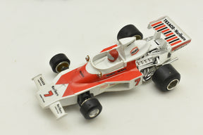 Red and white McLaren race car toy with Texaco and Marlboro decals for Polistil Evolution ART A.100
