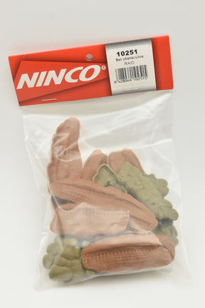 Assortment of brown and green plastic off-road obstacles in a clear bag for Ninco 10251, front view