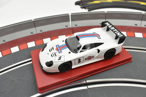 White race car model with Martini stripes on a red base for Fly Car 87002