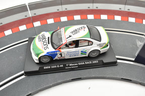 Slot car of a 2003 BMW 320i E-46 race car on a track for Fly Car 88107