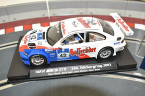Slot car of a 2003 BMW M3 GTR race car on a display base for 88084 A-291
