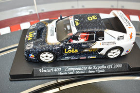 Scale model race car, Venturi 400, on display base for Fly Car 88036