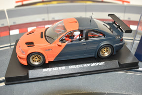 Orange and gray slot car of a BMW M3 GTR race car for Fly Car E-280