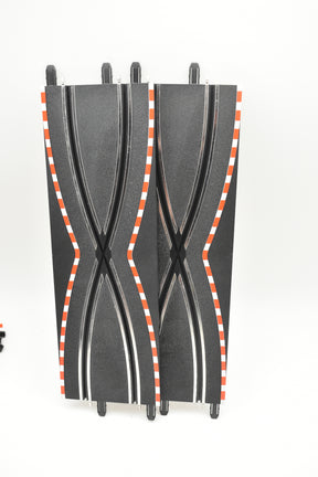 Two black, curved, compact suitcases with orange and white stripes for SCX Compact SC-01.029