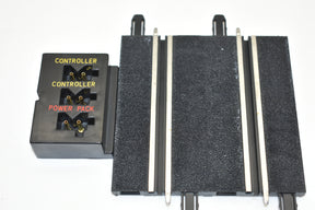 Terminal track connector with labeled controller and power pack sections for SCX Compact SC-01.052