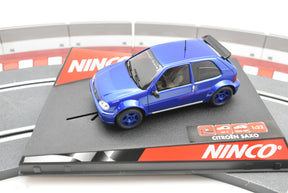 Blue slot car on a race track base for Ninco 50272