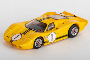 Yellow Ford GT40 race car model with black racing stripes and number one for AFX/Racemasters 22025