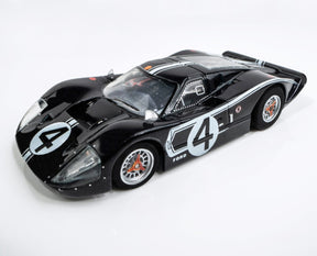 Black Ford GT40 race car model with white "4" racing number for AFX/Racemasters 22048, front view