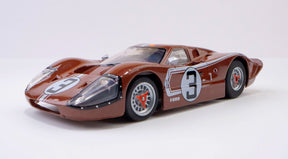 Brown Ford GT40 race car model, number 3, on white background for AFX/Racemasters 22053