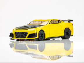 Yellow slot car of a 2021 Camaro ZL1 1LE for AFX/Racemasters 22075, front view