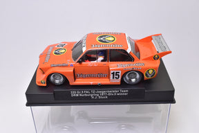 Orange slot car replica of 1977 Jaegermeister race car, #15 for Sideways SW41B