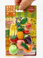 Colorful fruit-shaped pencil erasers in a branded card packaging for BC Mini 38371