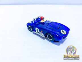 Blue toy car replica of a 1971 AC Cobra with number 8 for TYCO PRO 1971ACC8