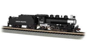 Black model train locomotive, Union Pacific 1840, on tracks for Bachmann 51558