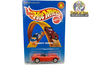 Red and blue 53 Corvette convertible toy cars in packaging for Hot Wheels