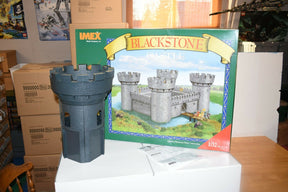 Model kit box and assembled gray castle piece for Blackstone Castle for IMEX IMX3282