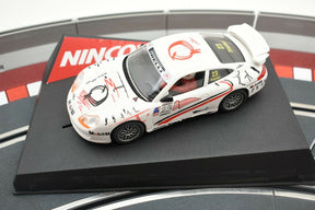 White race car model on black base with "NINCO" logo for 50210
