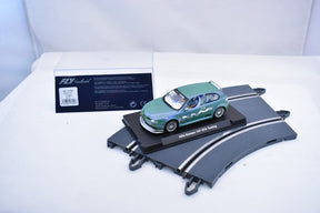Green slot car on a display base for Fly Car 07049