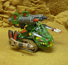 Green sci-fi robot toy with mounted cannons and treads for Robogear 6008