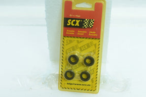 Yellow packaging with four black wheels for model cars for SCX/Scalextric 87690