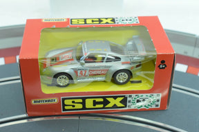Matchbox Porsche 911 toy car in box, featuring Chereau racing livery for SCX 83490.20