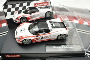 Model car of a white Porsche 918 Spyder with red accents and number 3 for Carrera 48627477