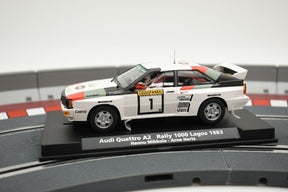 Scale model of 1983 Audi Quattro A2 rally car on a track base for Fly Car 88226