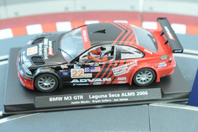 Red BMW M3 GTR race car model on a display base for Fly Car 88266, front view