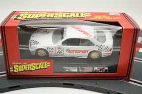 White BMW race car in box, showing Autosport branding for Scalextric C.571